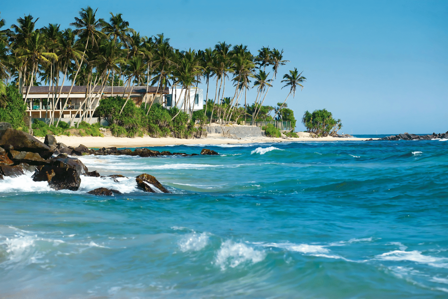 Pristine beaches, lush landscapes, and cultural landmarks of Sri Lanka, perfect for travelers booking tours from Delhi with Tripvedas Yatra & Holidays, India’s trusted travel agency.