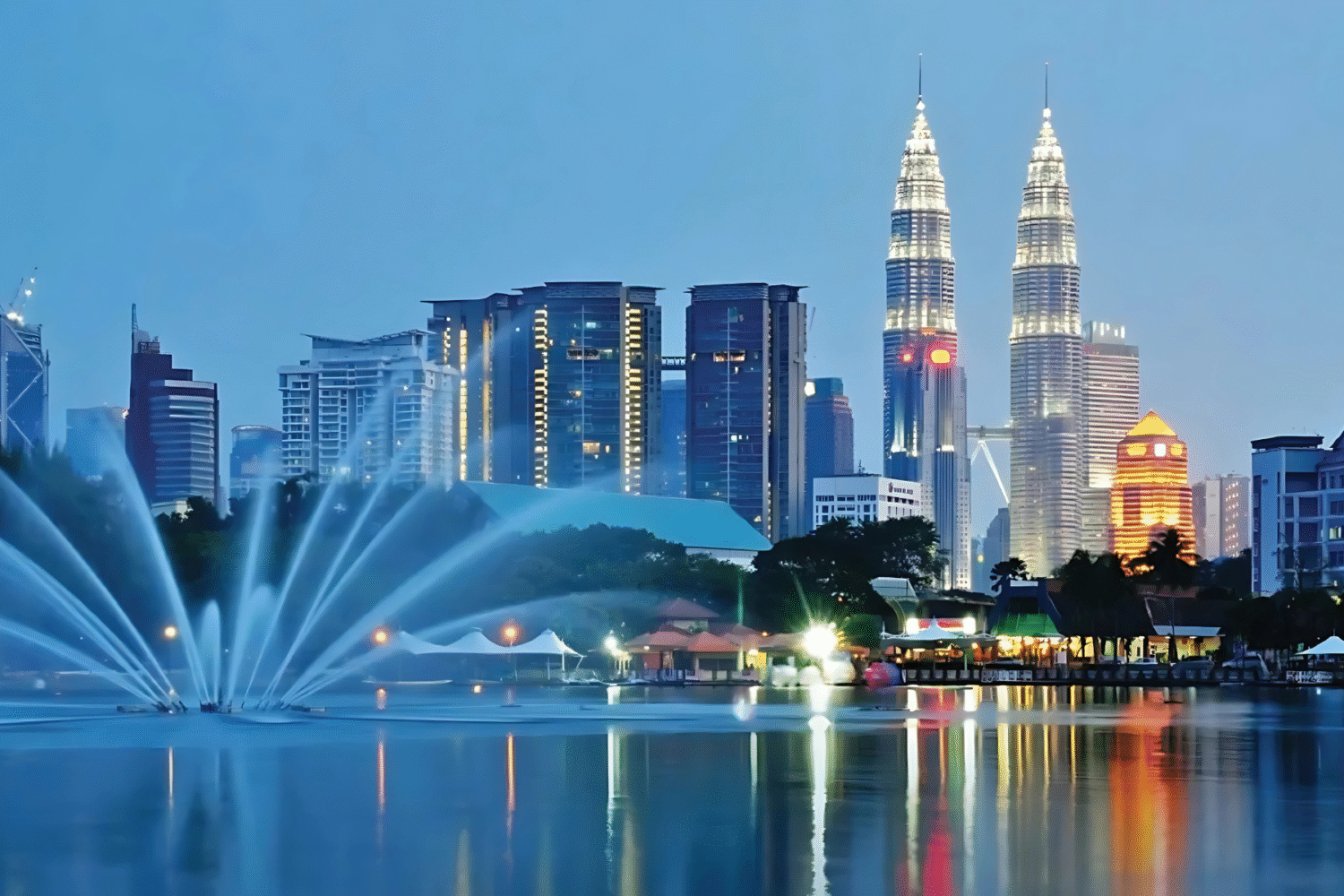 Scenic view of Malaysia highlighting cultural landmarks and natural beauty, ideal for travelers booking tours from Delhi with Tripvedas Yatra & Holidays, one of the best travel agencies in Delhi and India.