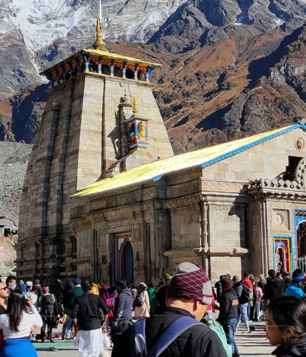 Breathtaking helicopter perspective of the Do Dham Yatra, capturing the serene landscapes and spiritual ambiance of Kedarnath and Badrinath temples, ideal for pilgrims traveling from Delhi.
