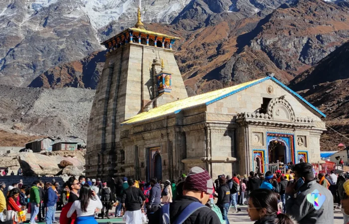 Breathtaking helicopter perspective of the Do Dham Yatra, capturing the serene landscapes and spiritual ambiance of Kedarnath and Badrinath temples, ideal for pilgrims traveling from Delhi.