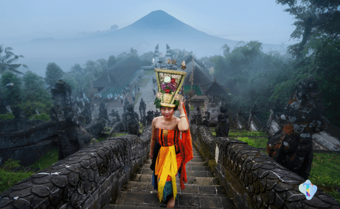 Scenic aerial view of Bali featuring a private villa in Ubud, surrounded by lush landscapes and stunning sunset vistas, capturing the essence of a 4N/5D romantic escape with relaxation, adventure, and tropical beauty.