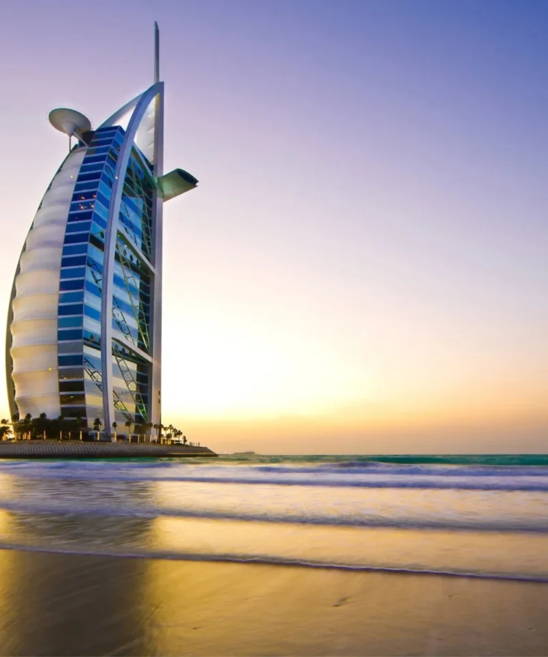 Couple enjoying an exhilarating Ferrari ride in Dubai, capturing the thrill and luxury of their honeymoon adventure with unforgettable memories.