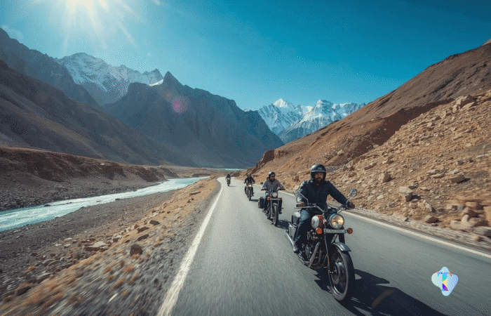 Breathtaking view of Spiti Valley during the Delhi – Jibhi – Chitkul – Kalpa – Dhankar – Kaza – Chandratal – Manali – Delhi bike and backpacking trip, featuring rugged mountains, winding roads, and adventurous travelers, organized by Tripvedas Yatra & Holidays, one of the best travel agencies in Delhi and India.