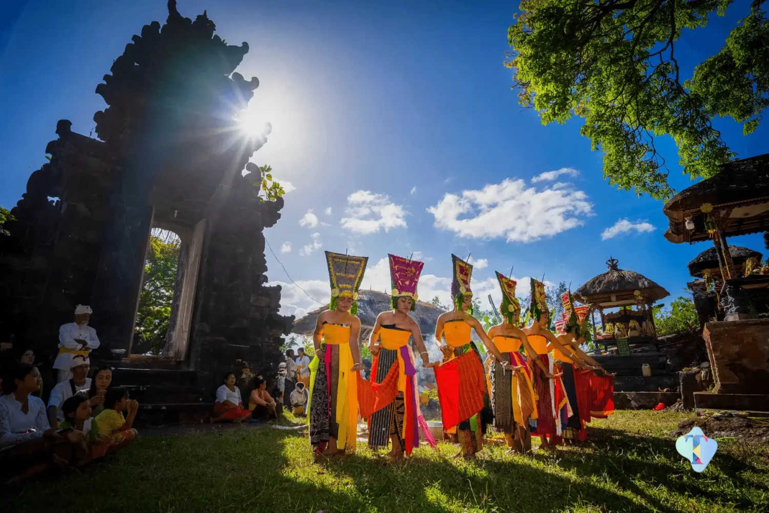Aerial view of a private villa in Ubud, Bali, surrounded by lush greenery and golden sunset skies, capturing the essence of a 4N/5D romantic getaway with a perfect mix of adventure, relaxation, and tropical charm.